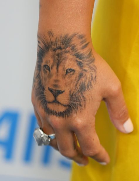 The Ultimate Celebrity Tattoo Gallery Demi Lovato Tattoos, Tattoos In The Workplace, Lion Tattoo Meaning, Female Lion Tattoo, Lion Hand Tattoo, Ariana Grande Tattoo, Horoscope Tattoos, Body Image Art, Hand Tattoos For Women