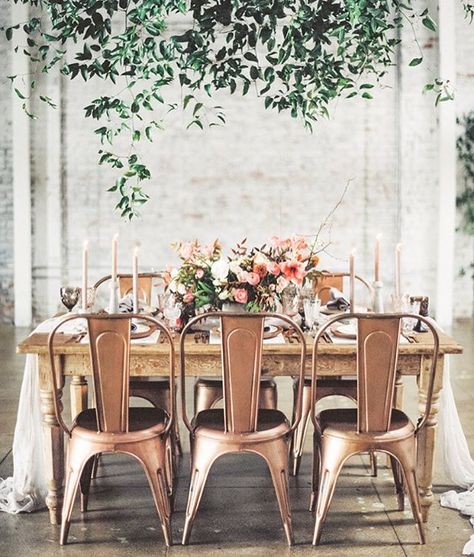 A tablescape surrounded by industrial metal chairs and a rustic farm house table delicately draped with a silk runner. Romantic Dinner Tables, Copper Chair, Fall Wedding Color Schemes, Interior Design Minimalist, Copper Wedding, Modern Wedding Inspiration, Romantic Home Decor, Decoration Originale, Fall Wedding Colors