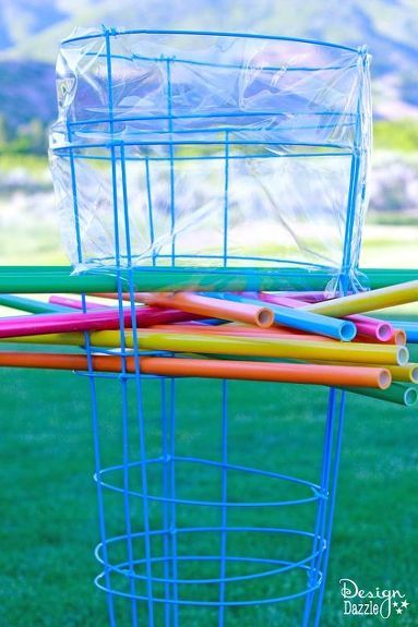 Trying to find a way to get your family outdoors for good summer memories here is a family game! Make a giant outdoor Kerplunk game from tomato cages! The object of Kerplunk is to pull out a stick without making the balls drop. Everyone takes a turn pulling a stick out one by one. Then if a ball or two drops (or 30) you keep them and at the end of the game count how many balls you made drop. The one who has least amount of points (balls dropped) wins! The first thing we worked on was… Kerplunk Game, Giant Outdoor Games, Yard Games For Kids, Backyard Kids Party, Backyard Party Games, Outdoor Yard Games, Diy Yard Games, Outdoor Party Games, Outside Games