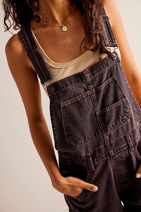 A shortened version of our favorite Ziggy Overalls! **Fit:** Relaxed, bib-and-brace silhouette **Features:** Front bib pocket, rolled hemlines, adjustable straps, side button closures, five-pocket design, frayed cuffs **Why We | We The Free Ziggy Shortalls at Free People in Dirty Deeds, Size: XS Ziggy Shortalls, Ziggy Overalls, Overalls Outfit Short, Black Overalls Outfit, Athletic Summer Outfits, Black Women Streetwear, Women Streetwear Summer, Summer Outfits Athletic, Boho Chic Outfits Summer