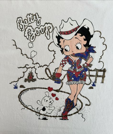 Cowgirl Betty Boop is our favorite Betty Boop 🤠 This glittery vintage Diamond Dust tshirt from 1991 is a real collector’s item. #vintagestyle #countrymusic #90sfashion #cowgirlstyle Cowboy Betty Boop, Cowgirl Betty Boop, Betty Boop Cowgirl, Betty Boop Wallpapers, Betty Boop Dog, Underglaze Designs, Ceramic Underglaze, Widget Pics, Cowgirl Tattoos