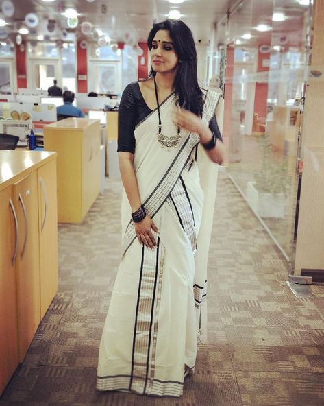 Nyla Usha on Instagram: “Happy Vishu! May everything good we see, come back to us! 🧐🌼🎍🍋🌿” Black Set Mundu Kerala, Set Mundu Blouse Design, Set Mundu Kerala, Set Saree Kerala, Nyla Usha, Happy Vishu, Black And White Saree, Kerala Saree Blouse, Kerala Saree Blouse Designs