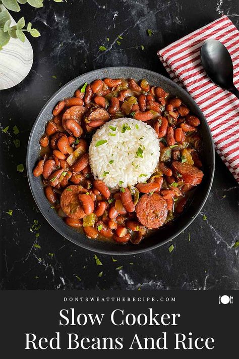 Our Slow Cooker Red Beans and Rice recipe is SOOO GOOD! You will never consider red beans and rice from a box. #crockpot #slowcooker #redbeans #cajun Crockpot Red Beans And Rice With Sausage, Slow Cooker Red Beans And Rice, Red Beans And Rice Crockpot, Mexican Crockpot Recipes, Crockpot Red Beans, Red Beans And Rice Recipe Crockpot, Slow Cooker Red Beans, Red Beans And Rice Recipe, Red Beans N Rice Recipe