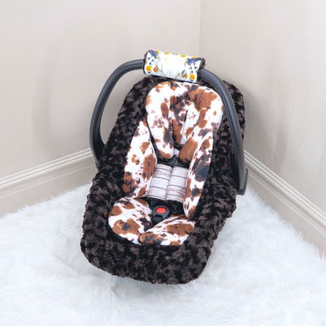 Travel anywhere with your precious little one in this stunningly gorgeous baby boy car seat insert cushions accessories! The prints and materials we use to make our items are extremely high quality, vibrant, and super soft to the touch. (Plastic car seat is not for sale, only the accessories displayed on the car seat) This Products Details ️️️️️️️️ -Ultra smooth and vibrant high-quality material -The 2 strap cover cushions ensure your little one is comfortable and protected from those rough car seat straps. They are also reversible. -The Headrest contains 100% hypoallergenic cotton stuffing and will ensure your baby's head is gently supported. -The handle/arm cushion contains a thick foam middle layer so you can carry your precious cargo comfortably. It is also reversible. -The fitted Mink Baby Carriers, Newborn Stuff, Country Baby Stuff, Western Baby Boy, Baby Things, Baby Stuff, Country Baby Rooms, Cow Print Car Seat, Cow Print Car Seat Cover