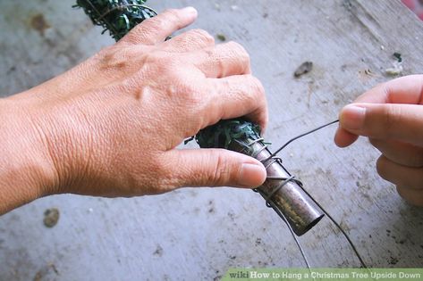 How to Hang a Christmas Tree Upside Down: 8 Steps (with Pictures) Original Christmas Tree, Upside Down Christmas Tree, Artificial Tree Branches, Hanging Upside Down, Wrapped Lights, Tree Base, Hanging Christmas Tree, How To Hang, The Trinity