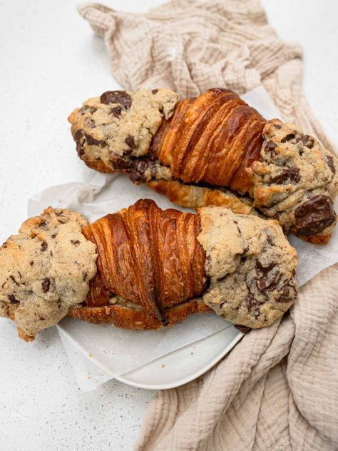 Gooey cookie dough studded with chocolate chunks layered in a flaky croissant topped with cookie dough baked to crunchy golden perfection Gooey Cookies, Cookie Dough, Dough, Baking