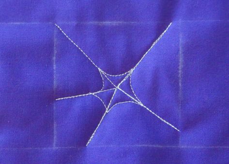 How to Free-motion Quilt a Spider Web | WeAllSew Spider Web Design Pattern, Spider Web Free Motion Quilting, Spiderweb Quilting Design, Spider Web Quilting, How To Make Spiders, Longarm Quilting Tutorials, Spooky Spider Web, Halloween Sewing Projects, Quilting Motifs