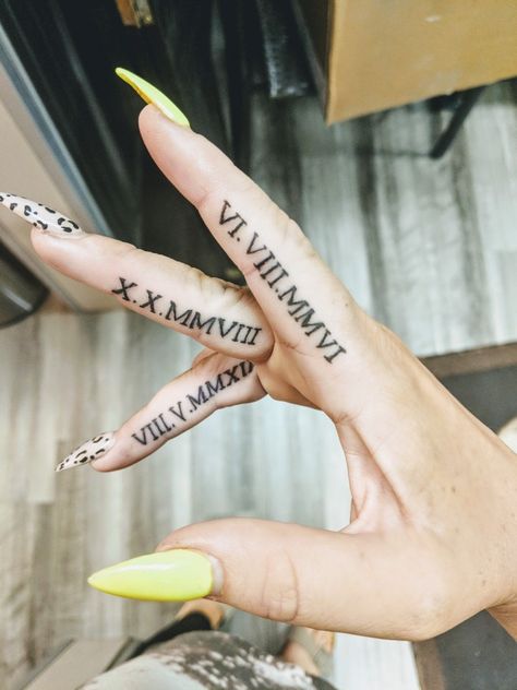 Roman numeral birthdates Roman Numeral Nails Design, Roman Numerals Finger Tattoo, Roman Numeral Tattoo On Finger, Finger Roman Numeral Tattoo, Roman Numeral Tattoo On Hand, Roman Numeral Hand Tattoo, Roman Numeral Tattoo Finger, Roman Numeral Finger Tattoo, Finger Nail Tattoo