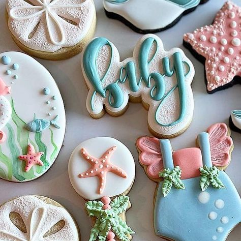 L A D I E S • W H O • B A K E on Instagram: "🐚 Under the Sea 🐚  Made this sweet set for our best friend’s baby shower.  • • • #underthesea #undertheseacookies #babyshower #babyshowercookies #sanddollarcookies #seastar #starfish #starfishcookies #seashells #cookiedecorator #designercookies #cookiestagram #cookielife #cookiedesign #decoratedcookie #decoratedsugarcookies #customcookies #customsugarcookies #cookieartist #cookieart #miamicookies #miamisweets #royalicing #royalicingcookies #royalicingart #edibleart #cookiesofinstagram  #ladieswhobake" Under The Sea Baby Shower Ideas For Girl, Under The Sea Baby Shower Cookies, Ocean Baby Shower Theme Girl, Under The Sea Cookies 1st Birthday, Beach Girl Baby Shower Ideas, Beach Baby Shower Cookies, Sea Theme Cookies, Sand Dollar Cookies, Starfish Cookies