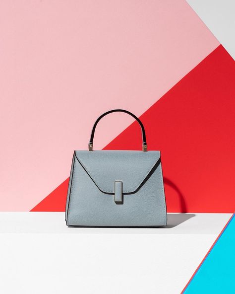 Valextra on Instagram: “The Valextra’s most #iconic #bag, the Iside, with its rigid, architectural trapeze shape, has become Valextra’s most popular model and a…” Kate Spade Crossbody, Most Popular, Product Launch, Graphic Design, Architecture, On Instagram, Instagram, Design