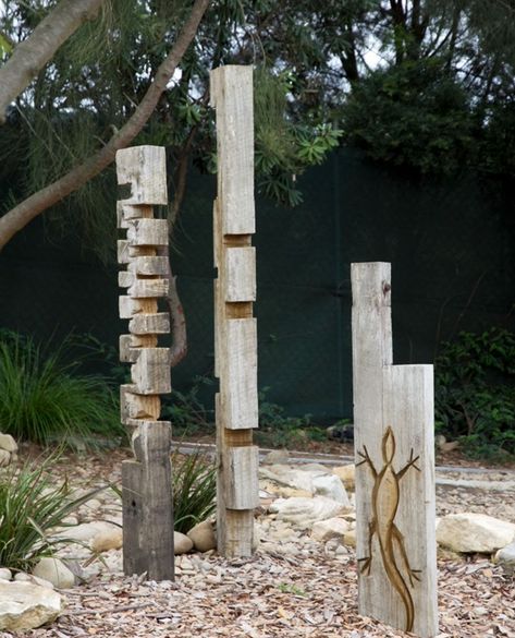 Carved timber sculptures, abstract garden art pieces Wooden Sculptures Outdoor, Garden Wood Sculpture, Arborsculpture Trees, Modern Totem Pole, Sculpture Park Landscape, Chainsaw Sculpture, Circular Art, Tropical Garden Design, Garden Totems