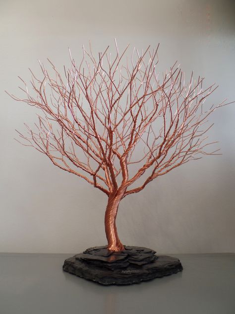 Copper Tree - We are proud to be the exclusive dealer in CT of these beautiful hand made metal sculptures reminiscent of the windblown trees on our eastern shoreline. The artist creates table sculptures as well as wall hung single trees. Metal Wire Tree, Wire Trees Diy How To Make, Metal Jewelry Handmade, Bonsai Wire, Wire Bonsai, Paper Folding Crafts, Crafting Wire, Copper Wire Art, Copper Tree