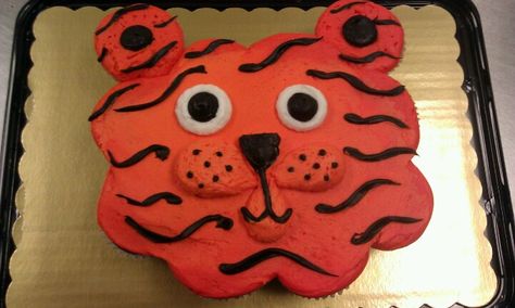 Tiger cupcake cake Tiger Cupcake Cake, Tiger Cakes, Auburn Cake, Tiger Cupcakes, Cub Scout Cake, Shaped Cupcakes, Pull Apart Cupcake, Tiger Party, Tiger Cake