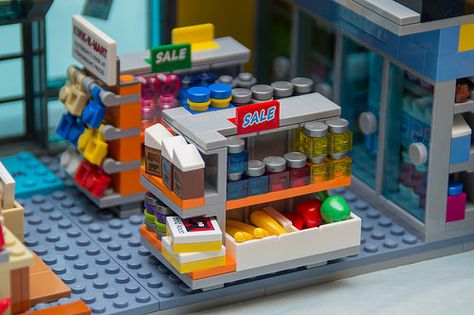 LEGO 71016 Simpsons Kwik-E-Mart | Read the review over at To… | Flickr Lego Supermarket Ideas, Lego Supermarket, Lego Town Ideas, Chief Wiggum, Lego House Ideas, Lego Universe, Lego Furniture, Vegetable Patch, Light Blue Walls