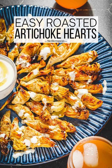 Roasted artichoke hearts made with canned artichokes, olive oil, salt, and pepper. Serve with creamy feta dressing for an easy appetizer. Canned Artichoke Recipes, Canned Artichokes, Roasted Artichoke Hearts, Artichoke Appetizer, Artichoke Heart Recipes, Feta Dressing, Mediterranean Appetizers, Baked Artichoke, Roasted Artichoke