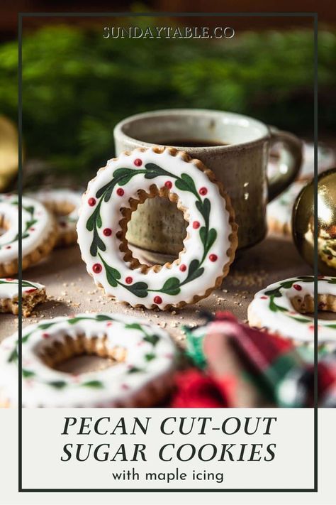 These pecan sugar cookies with maple icing are the absolute best! They are buttery and full of flavor thanks to brown sugar, vanilla, and toasty pecans. Decorate them like wreaths for a cute, easy Christmas cookie or use any shapes you like! This dough is so easy to cut out and decorate. The maple icing is easy to color and pipe designs. I love making these for an autumn or easy Christmas dessert. They're so fun! If you're a fan of pecans, you're going to love these delicious sugar cookies. Pecan Cutout Cookies, Sugar Cookie Designs Christmas, Pecan Sugar Cookies, Christmas Cookie Wreath, Christmas Sugar Cookie Designs, The Best Sugar Cookies, Easy Christmas Dessert, Maple Icing, Thank You Cookies