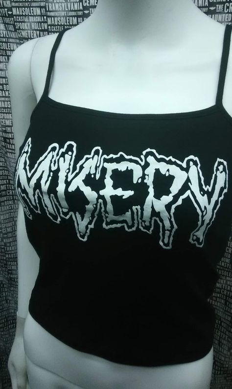 This is a black official Misery crop tank top with spaghetti straps. This has a Misery image screen printed on the front. 57% cotton/ 38% polyester/ 5% SpandexThese are handmade screenprinted and slightly vary from the photo. Please feel free to email me any questions. Thanks for looking.Due to an influx of incorrect addresses if a package is returned,  you must pay the shipping cost to resend the item to you.I do not do exchanges and I do not take returns unless the item is damaged. I thoroughl Misfits Crop Top, Gothic Oc, Skull Crop Top, Goth Tops, Gender Fluid Fashion, Crust Punk, Scene Outfits, Black Crop Top Tank, Black Cropped Tank