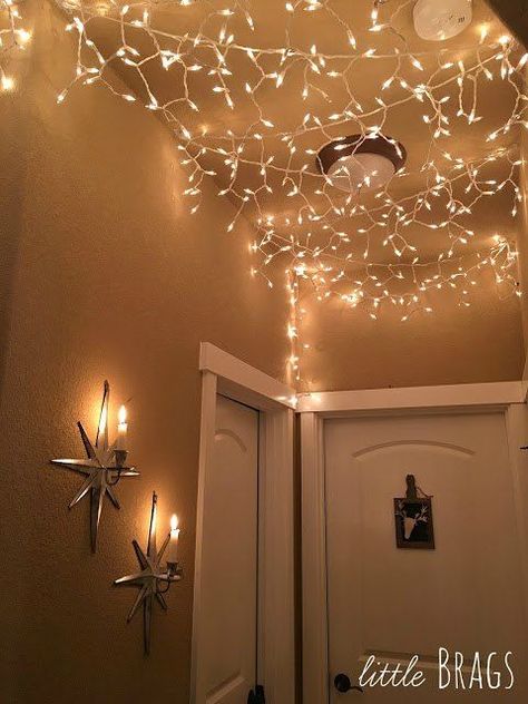 s make your home a winter wonderland with these stunning ideas, Magical Winter Icicle Hallway Christmas Ceiling Decorations, Hallway Ceiling, Indoor Christmas Lights, Christmas House Tour, Christmas Light Installation, Hanging Christmas Lights, Magical Winter, Mormon Temple, Icicle Lights