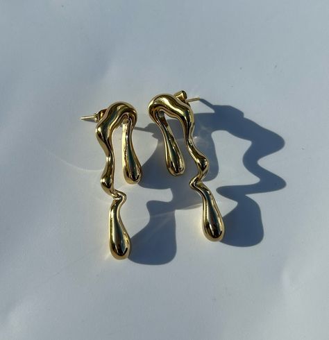 Lyric earrings 1500/= 18k gold plated Stainless steel material Available #s_cjewels #jewelryaddict Gold Statement Jewelry, Jewelry Product Shots, Asymmetrical Earrings, Minimal Jewelry, Catania, Jewelry Business, Accessories Store, Stainless Steel Material, Stainless Steel Jewelry