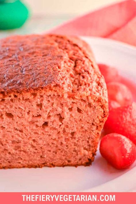 Like a firmer piece of strawberry cake, this quick easy vegan strawberry bread recipe comes together in minutes using frozen strawberries (no messing around with hulling or chopping). Surprise guests or loved ones with this pretty dairy-free homemade quick bread (yeast free!)that would make the perfect Valentine's Day or any day dessert. This recipe is perfect for when you fancy something sweet and fruity and a little bit different Using Frozen Strawberries, Strawberry Bread Recipe, Vegan Valentines, Strawberry Bread Recipes, Bread Yeast, Spicy Vegetarian Recipes, Vegan Bread Recipe, Strawberry Bread, Quick Easy Vegan