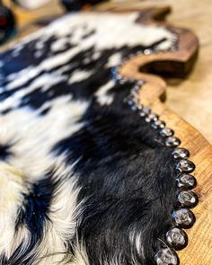 Cowhide Upholstery Diy, Diy Cowhide Headboard, Animal Hide Decor Ideas, Cow Hide Crafts, Cow Furniture, Pendleton Furniture, Cowhide Headboard, Cowhide Projects, Western Chairs