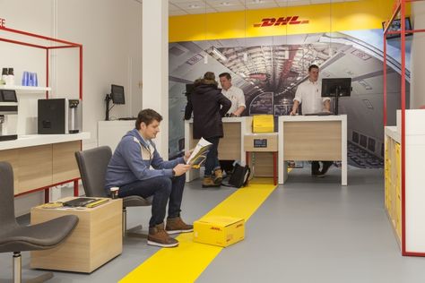 DHL store by Tchai International, Amsterdam – Netherlands » Retail Design Blog Dhl Office Interior, Gold Bars For Sale, Service Counter, Bicycle Brands, Office Pictures, Space Photography, Ocean Freight, Gold Bars, Shop Fittings