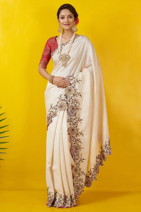 Featuring an ivory cutwork saree in silk cotton base with multi colored thread embroidery. It is paired with a contrasting rani pink blouse.  FIT: True to size. COMPOSITION: Silk cotton. CARE: Dry clean only. Ivory Saree, Cutwork Saree, White Embroidered Blouse, Rani Pink, Set Saree, Saree Gown, Embroidered Saree, Lehenga Saree, Sharara Set