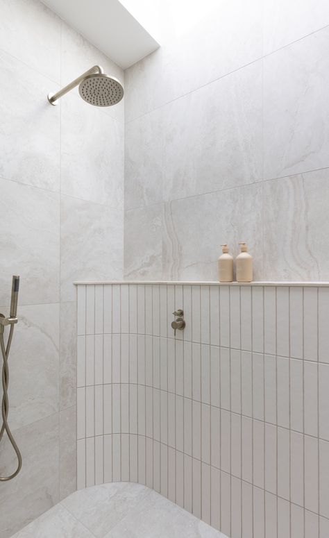 Curved shelf in shower of grey bathroom | Scandi-Med home tour Scandi Mediterranean, Modern Coastal Bathroom Ideas, Beach Bathroom Ideas Coastal Style, Niche In Shower, City Bathroom, Modern Coastal Bathroom, Scandi Bathroom, Style Curator, Mediterranean Holiday