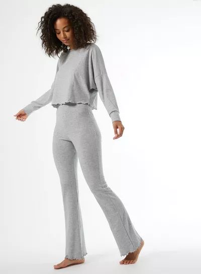 Ribbed Trousers Outfit, Ribbed Trousers, Outfit Grey, Trousers Outfit, Pointelle Sweater, Kick Flares, Cotton Leggings, Flare Trousers, Types Of Dresses