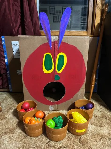 Hungry Caterpillar Craft For Toddlers, Trunk Or Treat Very Hungry Caterpillar, Very Hungry Caterpillar Trunk Or Treat, Caterpillar Birthday Party Ideas, Hungry Caterpillar Trunk Or Treat, Eric Carle Activities Preschool, Very Hungry Caterpillar Craft, Hungry Caterpillar Games, Eric Carle Party