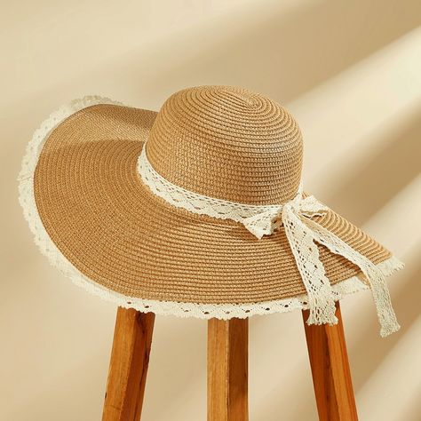 Sunshine on your mind? Our Straw & Lace Wide Brim Hat is a must-have for those sunny days ahead. It pairs delicate lace detailing with durable straw construction to keep you shaded and chic. Whether worn at the beach, a garden party, or a resort vacation, this hat offers both sun protection and a chic, summery look. Product code: CAC03C4E004HC Large Straw Hat, Big Straw Hat, Cute Sunhat, Garden Party Hat, Cute Summer Hat, Sunhat Aesthetic, White Sunhat, Ace Hat, Cottagecore Hat