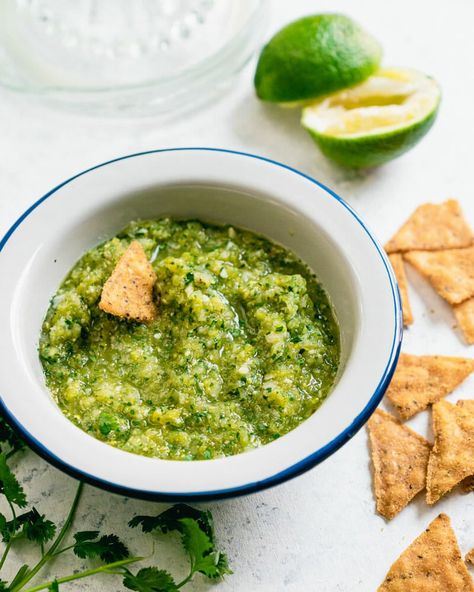 Wondering what to do with green tomatoes? Make green tomato salsa, of course! They blend into a zesty dip that tastes just like salsa verde. #greentomatoes #green #tomatoes #recipe #healthy #mealprep #salsa Green Tomato Salsa, Pickled Green Tomatoes, Tomato Salsa Recipe, Fresh Salsa Recipe, Green Tomato Recipes, A Couple Cooks, Varieties Of Tomatoes, Homemade Tortilla Chips, Couple Cooking