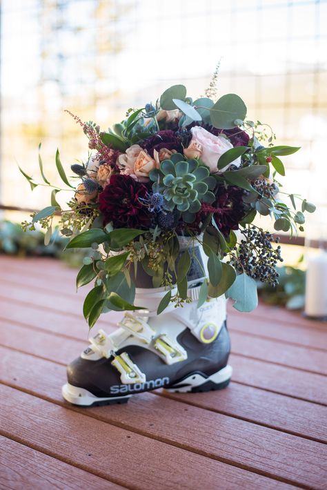 Weddings in the mountains mean ski boots are out. #MountainWeddings #FlowerSkiBoot #PetalandBean #WinterWeddings Ski Boot Decor Ideas, Ski Theme Wedding Ideas, Ski Themed Wedding Decor, Mountain Theme Decorations, Ski Chalet Wedding, Mountain Themed Wedding Centerpieces, Ski Centerpieces, Ski Wedding Theme, Ski Baby Shower Ideas