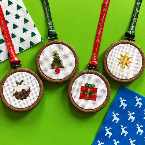 This Is an all in one kit containing all the materials to make 4 Christmas cross stitch decorations - a Christmas pudding, a Christmas tree, a gift-wrapped present and a star. These are perfect for hanging on your Christmas tree and include mini hoops to hang them in, Christmas themed ribbon and felt.  Kit includes - 4 pieces of 14 count cross stitch fabric - Embroidery thread - 2 Needles - 4 Patterns - Full Instructions - 4 x 2.5 inch flexi hoops - Christmas themed felt for backing the hoops - Easy Christmas Cross Stitch, Easy Cross Stitch Christmas Ornaments, Mini Christmas Cross Stitch, Cross Stitch Christmas Tree Ornaments, Tiny Christmas Cross Stitch, Cross Stitch Mini Christmas, Cross Stitch Gift Ideas, Christmas Simple Cross Stitch, Cross Stitch Patterns Easy