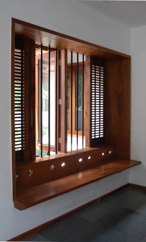 Jeena's Residence | Projects | Bhoomija Creations Wooden Windows Ideas, Traditional Window Design, Window And Door Designs, Kerala Window Designs, Indian Wood Window Design, Window Wood Design, Window With Seating Area, Nadumuttam Ideas, Wooden Room Design