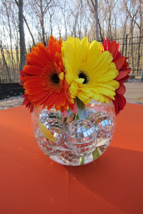 Disco balls and daisies - backyard birthday with jazzed up floral centerpieces. | AnnaBelle Events Abba Party, 70s Birthday, Decades Party, 70s Party Theme, 70s Flowers, 70s Theme, 70s Disco Party, Disco Birthday, Mums Birthday