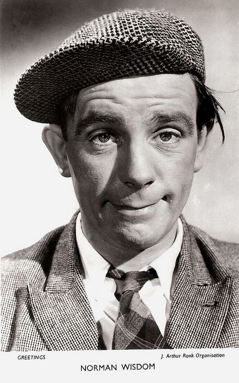 Norman Wisdom. British postcard. Photo: J. Arthur Rank Organisation. Norman Wisdom, English Comedy, Blackpool England, British Movies, Comedy Actors, Actors Male, British Comedy, Celebrity Portraits, Famous Men