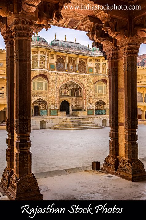 Amer Fort Jaipur Rajasthan main entrance gateway with intricate artwork and pillar structure. Download high resolution Rajasthan stock photos and royalty free images. Amer Fort Photography, Amer Fort Jaipur Photography, Rajasthan Palace, Temple Exterior, Amer Fort Jaipur, Palace Entrance, Heritage Photography, Rajasthan Travel, Ancient Persian Architecture