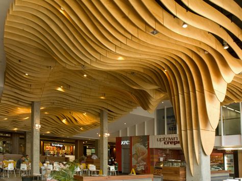 Wave Ceiling Wave Ceiling Design Interiors, Wave Ceiling, Soundproof Ceiling, Sports Facility, Ceiling Detail, Wood Beam Ceiling, Curved Wood, Restaurant Menu Design, Ceiling Hanging