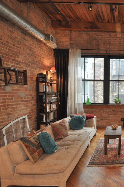 Living Room With Red Brick Wall, Warm Colors For Living Room, Brick Loft Apartment, Chicago Loft Apartment, Loft Apartment Designs, Curtain Height, Colors For Living Room, Brick Wall Living Room, Brick Room