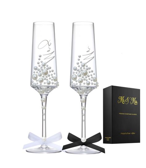 PRICES MAY VARY. Engagemen Gift For The Couples - Mr and Mrs champagne flutes glasses set is a marriage gift for wedding, engagement, anniversary, bridal shower, Valentines’ day to wedding newlyweds, bride and groom, husband and wife, girlfriend and boyfriend. Elegant Pearl Design - Mr and Mrs plastic pearl champagne flutes with long stems feature a beautiful and classy design. Each flute features shimmering faux pearls cascading beautifully down the slender glass stem, creating a striking and r Bridal Shower Champagne Glasses, Bridal Glasses, Glitter Wine Glasses Diy, Bridal Shower Champagne, Marriage Gift, Wedding Toasting Glasses, Glitter Wine Glasses, Bride And Groom Glasses, Wedding Wine Glasses