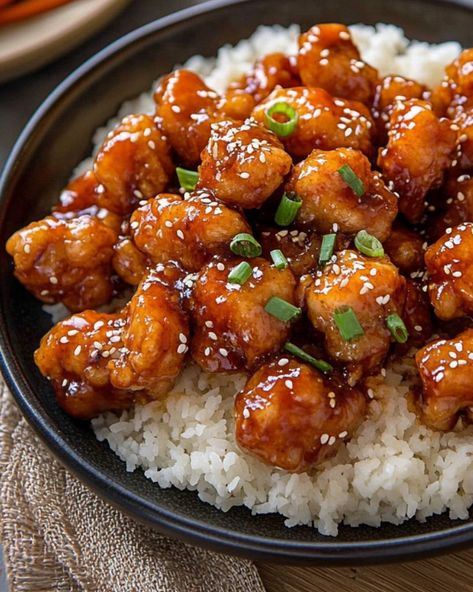 Make restaurant-quality General Tso’s Chicken at home with this easy recipe. Crispy fried chicken is coated in a sweet and tangy sauce, perfect for a quick weeknight dinner or a special takeout-inspired meal. Pair it with steamed broccoli or rice for a complete dish. Learn how to make this classic Chinese-American favorite with simple ingredients and customizable spice levels. Tso Chicken Recipe Easy, Crispy General Tso Chicken, Air Fryer General Tso Chicken, General Tso Chicken Sauce, General Tso Chicken Easy, General Tao Chicken, General Tso's Chicken Recipe, Smothered Pork Chops Recipe, Deep Dish Pizza Recipe