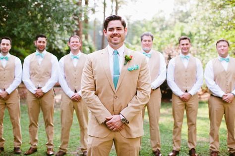 Groomsmen in just vests, groom only one with jacket. Tan and navy :) Teal Vest Wedding, Vest Groom, Tan Suit Wedding, Tan Tuxedo, Tan Suits, Teal Wedding Colors, Yellow Wedding Ideas, Khaki Suits, Beach Wedding Decorations Reception