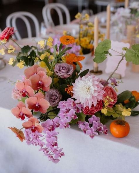 WILDERNESS FLOWERS on Instagram: "colour bombing inside @figtreerestaurant Still our favourite look 🌈🌈" Bright Wedding Decorations, Table Florals, Multicolor Wedding, Indie Wedding, Bright Decor, Flower Installation, Bridal Table, Bright Florals, Sunset Wedding