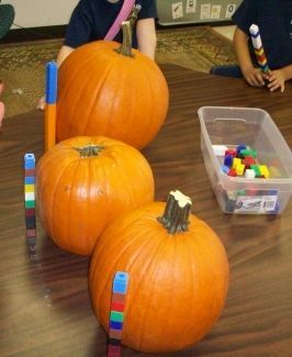 Amazing Pumpkin unit ideas...it has EVERYTHING pumpkin (science, literacy, music, art, dramatic play, math, etc). Check it out if you're in a theme based centre or if the children are interested in pumpkins in High/Scope. If you're in Montessori, well, I' Pumpkin Measuring Preschool, October Classroom Themes, Pumpkin Science Preschool, Preschool Pumpkins, Ece Classroom, Preschool Pumpkin, Pumpkin Science, Fall Math Activities, Unifix Cubes