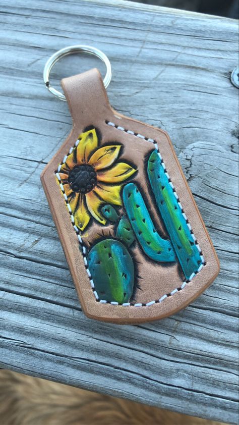 Tooled Leather Butterfly, Tooled Leather Cow Tag Keychain, Leather Tuscadero, Caw Girl, Diy Leather Ornaments, Sunflower Keychain, Leather Working Projects, Custom Leather Work, Leather Working Patterns