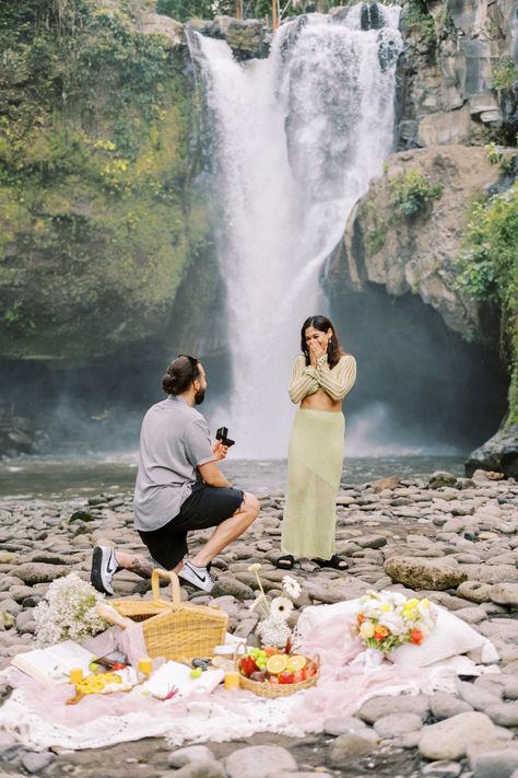 Bali Waterfall Surprise Proposal with A Picnic 6 Proposal Ideas Waterfall, Bali Proposal Ideas, Waterfall Proposal Ideas, Bali Proposal, Waterfall Proposal, Hawaii Proposal, Bali Waterfalls, Beach Proposal, Proposal Photography