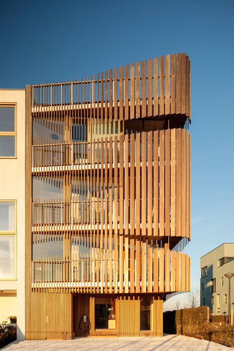 the \'freebooter\' apartment complex is born from the characteristics of the area it is built. Viewing Deck, Landscape And Urbanism Architecture, Wood Facade, Wooden Facade, Wooden Architecture, Genius Loci, Wood Architecture, China Town, Landscape And Urbanism