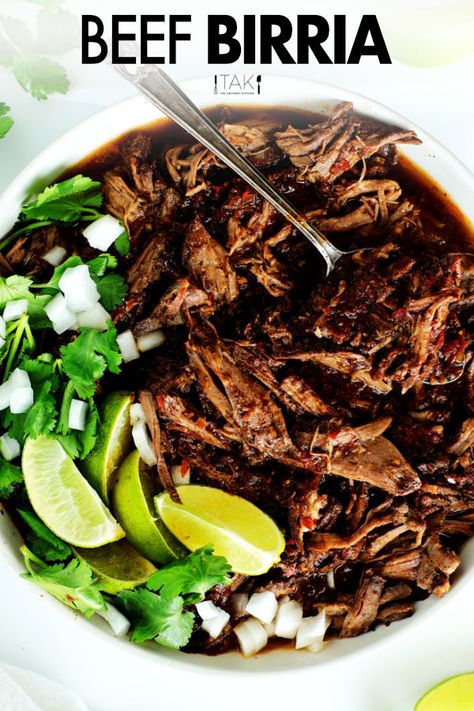 An overhead shot of a bowl of beef birria with diced onions, lime wedges and fresh cilantro. Birria Bowls, Pork Sliders Recipes, Potato Recipes Crockpot, Crockpot Fajitas, Birria Recipe, Beef Birria, Pot Roast Crock Pot Recipes, Roasted Baby Potatoes, Crockpot Chicken And Dumplings