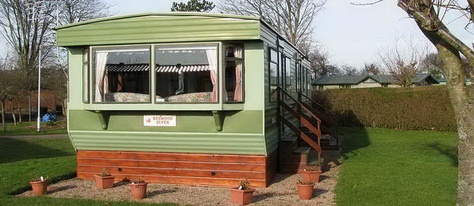 .home Vintage Mobile Home Remodel, Wood Skirting, Vintage Mobile Home, Single Wide Trailer, Trailer Parks, Vintage Trailers For Sale, Single Wide Remodel, Beach Trailer, Modern Mobile Homes